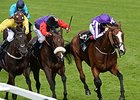 Leading Light and Joseph O'Brien (right) take the Gold Cup.<br><a target="blank" href="http://photos.bloodhorse.com/AtTheRaces-1/At-the-Races-2014/i-ksXv4R8">Order This Photo</a>