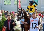 Commanding Curve at Kentucky Derby 140.
<br><a target="blank" href="http://photos.bloodhorse.com/TripleCrown/2014-Triple-Crown/Kentucky-Derby-140/i-ZT3ng77">Order This Photo</a>