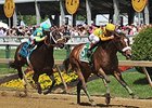 Meadowood rolls home to win the Chick Lang Stakes.<br><a target="blank" href="http://photos.bloodhorse.com/AtTheRaces-1/At-the-Races-2014/i-hMxZBq7">Order This Photo</a>