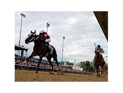 113,071 saw Untapable win the 2014 Kentucky Oaks.<br><a target="blank" href="http://photos.bloodhorse.com/AtTheRaces-1/At-the-Races-2014/i-DjHdsZx">Order This Photo</a>