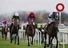 Pineau De Re pulls away to claim victory in the Grand National.