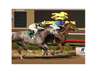 Grand Contender outfinishes Taptowne to win the Texas Mile.