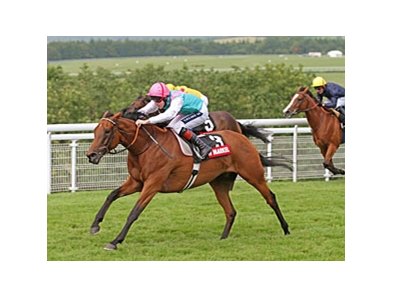 Midday powers home in the Nassau Stakes. <br><a target="blank" href="http://www.bloodhorse.com/horse-racing/photo-store?ref=http%3A%2F%2Fpictopia.com%2Fperl%2Fgal%3Fprovider_id%3D368%26ptp_photo_id%3D9620984%26ref%3Dstory">Order This Photo</a>