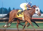 Seeking the Title goes by Harissa to win the Iowa Oaks.