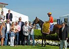 An on-track crowd of 38,957 watched Fiftyshadesofhay win the $500,000 Black-Eyed Susan Stakes.<br><a target="blank" href="http://photos.bloodhorse.com/AtTheRaces-1/at-the-races-2013/27257665_QgCqdh#!i=2517920876&k=HgPPVt7">Order This Photo</a>