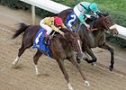 Tiago (inside) gets the nod over Heatseeker in the Oaklawn Handicap.