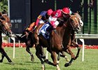 Rahystrada makes his move to win the Arlington Handicap.