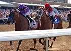 Mythical Power (left) outfinishes Euroears to win the Texas Mile.