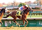 A. P. Arrow, shown winning the Clark Handicap, is the morning-line choice for the Pimlico Special.