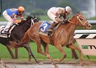 Le Mi Geaux pulls away late to win the Schuylerville at Saratoga.<br><a target="blank" href="http://www.bloodhorse.com/horse-racing/photo-store?ref=http%3A%2F%2Fpictopia.com%2Fperl%2Fgal%3Fprovider_id%3D368%26ptp_photo_id%3D9116368%26ref%3Dstory">Order This Photo</a>
