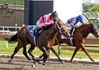 Major Gain (left) comes home strong to win the Arlington-Washington Futurity.