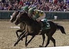 Cleburne (inside) holds off stablemate Smart Cover to win the Iroquois.