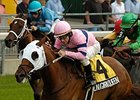 The Niagara Queen drives to victory in the Dance Smartly.