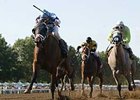 Silent Valor (left) takes the Sapling (gr. III) at Monmouth Park.