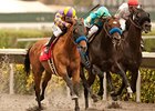 Kettle Corn (left) goes by Paynter (center) to win the San Diego Handicap.