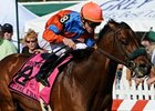 Strike a Deal and Ramon Dominguez take the Dixie Stakes.<br><a target="blank" href="http://www.bloodhorse.com/horse-racing/photo-store?ref=http%3A%2F%2Fpictopia.com%2Fperl%2Fgal%3Fprovider_id%3D368%26ptp_photo_id%3D8959437%26ref%3Dstory">Order This Photo</a>