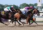 Favored Porte Bonheur holds on to win the First Flight Handicap at Belmont Park.<br><a target="blank" href="http://www.bloodhorse.com/horse-racing/photo-store?ref=http%3A%2F%2Fpictopia.com%2Fperl%2Fgal%3Fprovider_id%3D368%26ptp_photo_id%3D8280590%26ref%3Dstory">Order This Photo</a>