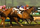 Crisp gets the jump on Blind Luck (left) to win the Santa Anita Oaks.<br><a target="blank" href="http://www.bloodhorse.com/horse-racing/photo-store?ref=http%3A%2F%2Fpictopia.com%2Fperl%2Fgal%3Fprovider_id%3D368%26ptp_photo_id%3D8825800%26ref%3Dstory">Order This Photo</a>