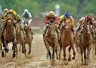 Orb leads the way to victory in the Kentucky Derby.<br><a target="blank" href="http://photos.bloodhorse.com/TripleCrown/2013-Triple-Crown/Kentucky-Derby-139/29213460_Rcqkd4#!i=2493218528&k=wLFcdHX">Order This Photo</a>