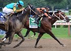 Poseidon's Warrior wins the Alfred G. Vanderbilt Handicap.
<br><a target="blank" href="http://photos.bloodhorse.com/AtTheRaces-1/at-the-races-2012/22274956_jFd5jM#!i=2008372972&k=NzCHmvN">Order This Photo</a>