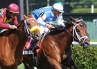 Interactif defeating Grand Rapport (left) in the Hall Of Fame Stakes.<br><a target="blank" href="http://www.bloodhorse.com/horse-racing/photo-store?ref=http%3A%2F%2Fpictopia.com%2Fperl%2Fgal%3Fprovider_id%3D368%26ptp_photo_id%3D9142495%26ref%3Dstory">Order This Photo</a>