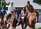 Tale Of Ekati heads to the Belmont Park main track escorted by 2003 Kentucky Derby winner Funny Cide.<br><a target="blank" href="http://www.bloodhorse.com/horse-racing/photo-store?ref=http%3A%2F%2Fpictopia.com%2Fperl%2Fgal%3Fprovider_id%3D368%26ptp_photo_id%3D4653383%0D%0A%26ref%3Dstory">Order This Photo</a>