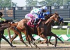 Funny Moon gets up late in the CCA Oaks.<br><a target="blank" href="http://www.bloodhorse.com/horse-racing/photo-store?ref=http%3A%2F%2Fpictopia.com%2Fperl%2Fgal%3Fprovider_id%3D368%26ptp_photo_id%3D8362414%26ref%3Dstory">Order This Photo</a>
