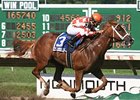 Just Jenda strolls home in the Monmouth Oaks.