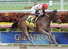 Successful Song splashes home in the Florida Sunshine Millions Distaff Stakes.<br><a target="blank" href="http://photos.bloodhorse.com/AtTheRaces-1/at-the-races-2013/27257665_QgCqdh#!i=2326839218&k=GgPz3dG">Order This Photo</a>