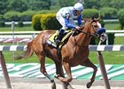 Funny Moon is in control in the Shuvee under Alan Garcia.<br><a target="blank" href="http://www.bloodhorse.com/horse-racing/photo-store?ref=http%3A%2F%2Fpictopia.com%2Fperl%2Fgal%3Fprovider_id%3D368%26ptp_photo_id%3D8959389%26ref%3Dstory">Order This Photo</a>