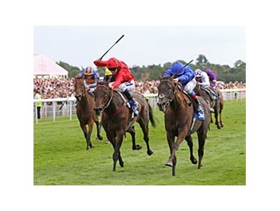 Blue Bunting and Frankie Dettori (right) take the Yorkshire Oaks.<br><a target="blank" href="http://www.bloodhorse.com/horse-racing/photo-store?ref=http%3A%2F%2Fpictopia.com%2Fperl%2Fgal%3Fprovider_id%3D368%26ptp_photo_id%3D9639863%26ref%3Dstory">Order This Photo</a>