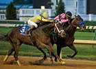 Code West (right) fights off Uncaptured to win the Matt Winn Stakes.
<br><a target="blank" href="http://photos.bloodhorse.com/AtTheRaces-1/at-the-races-2013/27257665_QgCqdh#!i=2577226364&k=TPvCXp4">Order This Photo</a>