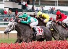 Yankee Fourtune and Victor Santiago score in the Commonwealth Turf.