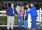 The connections of King Henny accepting the winning trophy.