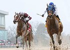 Gold Medal Dancer (right) holds off Untapable to win the Azeri at Oaklawn Park.