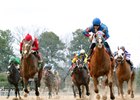 Valid Commander captures the NoDouble Breeders' Stakes at Oaklawn Park in Hot Springs, Arkansas.