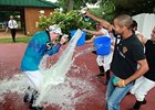 Jockey Monica Garcia is 'congratulated' after her first win.