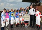 John Velazquez celebrates win number 5,000, joined by his fellow jockeys and trainer Todd Pletcher.<br><a target="blank" href="http://photos.bloodhorse.com/AtTheRaces-1/at-the-races-2013/27257665_QgCqdh#!i=2575389522&k=MsmC6Mh">Order This Photo</a>