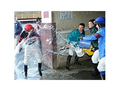Apprentice jockey Pierre Tomas (left) is "congratulated" after his first North American win.