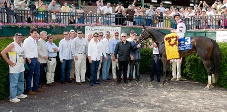 Royal Delta and jockey Mike Smith in the winner's circle for after the 2013 Delaware Handicap (G1) at Delaware Park on July 20, 2013.
