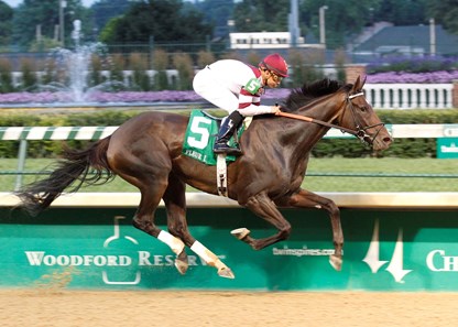 Jockey Mike Smith sat motionless in the saddle as Besilu Stables' Royal Delta, drew away to an easy eight-length victory in the 37th running of the Fleur de Lis Handicap.