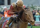 Orb and Joel Rosario win the Kentucky Derby.
