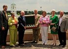 Dolphus Morrison (third from left) in Churchill Downs winner's circle after Rachel Alexandra's 2009 Kentucky Oaks win.
