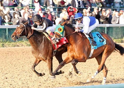 Arena Elvira (outside), trained by Hall of Famer Bill Mott and ridden by Junior Alvarado, fought off runner-up Afleeting Lady and jockey Kent Desormeux in the final yards of the 89th running of the Grade II Falls City Handicap at Churchill Downs.