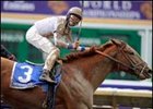 Cobalt Blue flies late to take the Select Stakes.