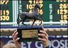 Garrett Gomez celebrates in the Winner's Circle after winning the 2007 Breeders' Cup Juvenile Fillies with Indian Blessing.