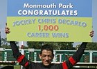 Jockey Chris DeCarlo celebrates the 1,000th winner of his career at Monmouth Park June 23.