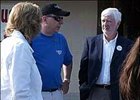 Ron Bamberger, right, with Jim Hines III and unidentified family member at Bob Holthus' barn on day sale of Lawyer Ron made official.