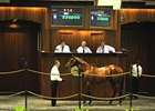 Hip 114, colt, Colonel John - Bon Caro by Bon Point, sold for $220,000 to top the select session.