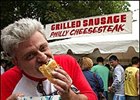 Some fans enjoy local delicacies as bettors make Smarty Jones the overwhelming favorite to complete the Triple Crown sweep.
